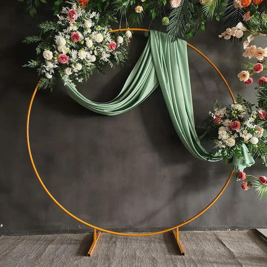 Elegant Gold Circular Backdrop with Delicate Flower Accents