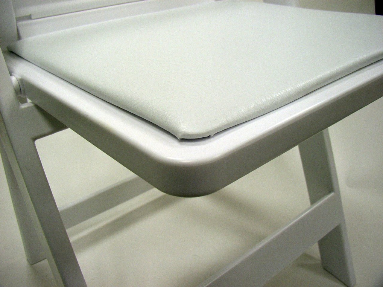 Resin Folding Padded Chairs - White Hire