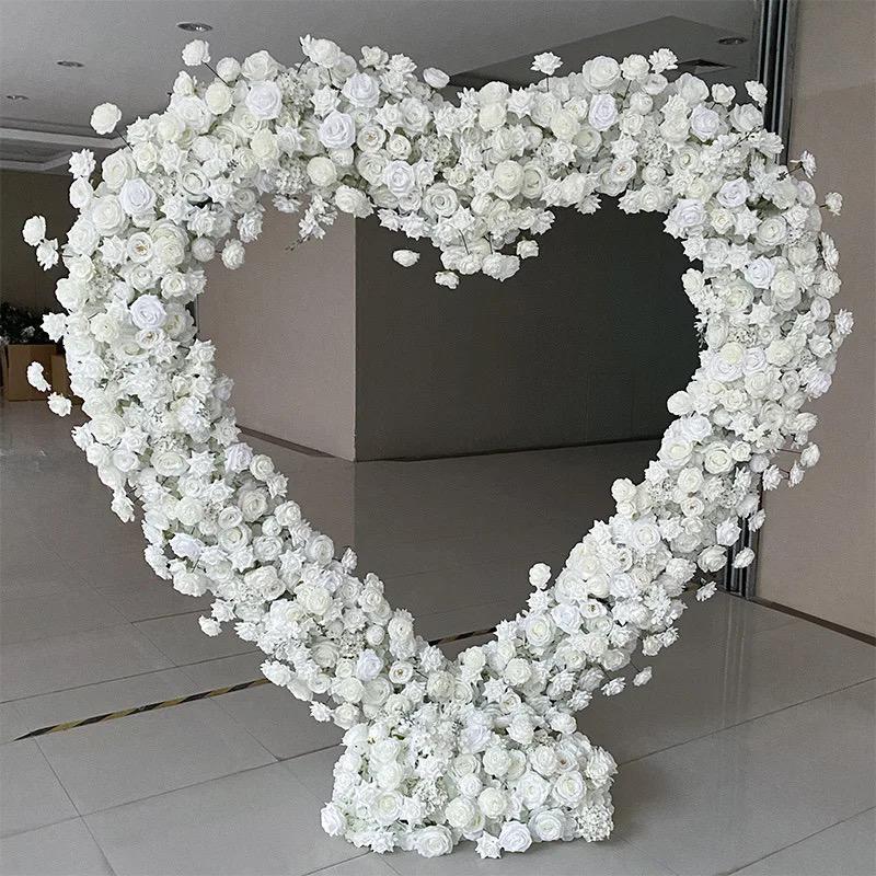 Elegance in Bloom: Heart Arch with White Flower Decor