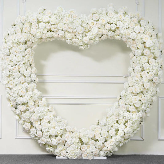 Elegance in Bloom: Heart Arch with White Flower Decor