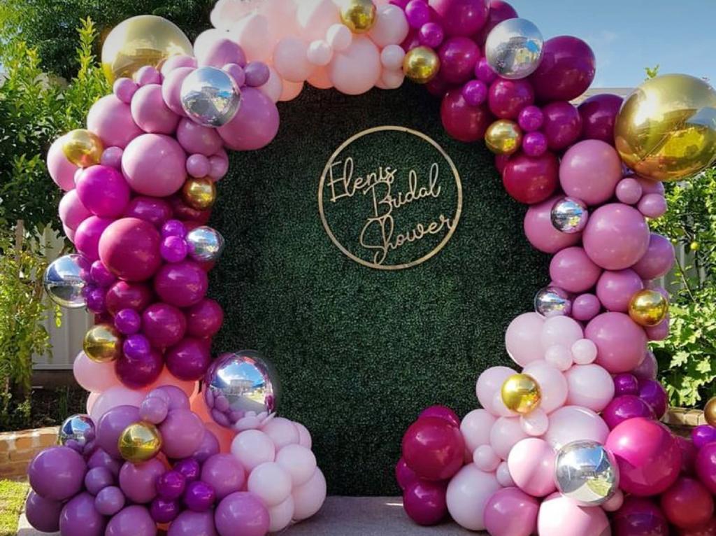 Elegant Garden Party Rental Package: Grass Wall Backdrop with Stunning Balloon Garland