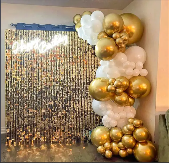 Enchanting Gold Shimmer Sequin Wall with Gold and White Balloon Rental